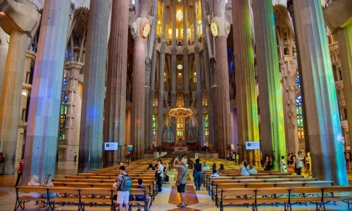 Sagrada Familia in Barcelona.Many tourists admire the light and shadow changes through the stained glass in the Sagrada Familia.